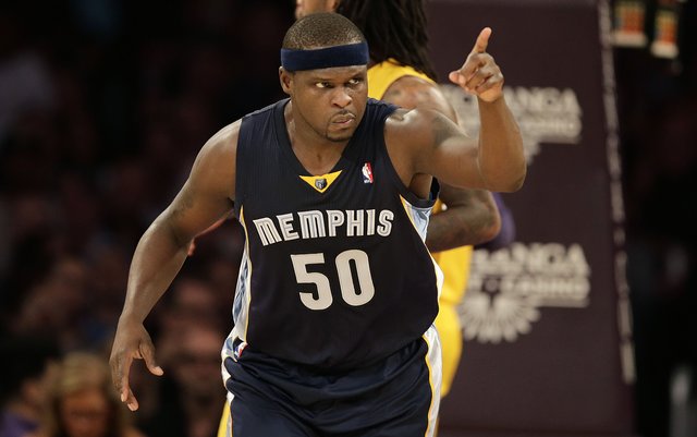 Memphis Grizzlies' Zach Randolph points to his teammate after making a basket during the first half of an NBA basketball game against the Los Angeles Lakers on Friday, Nov. 15, 2013, in Los Angeles. (AP Photo/Jae C. Hong)