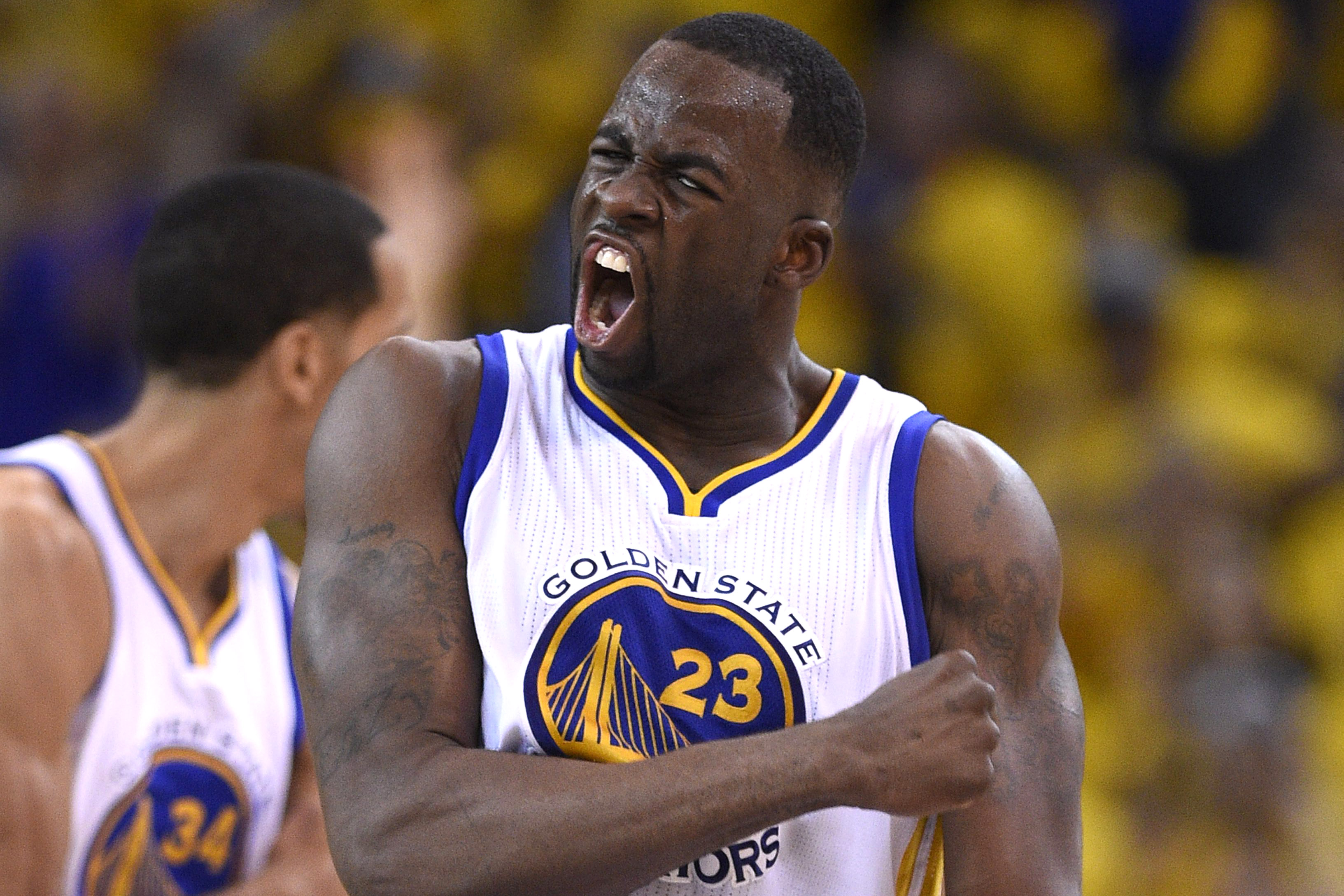 epa04714038 Golden State Warriors forward Draymond Green reacts after scoring a three point jumper against the New Orleans Pelicans during the second half of their first round NBA Playoff game two at Oracle Arena in Oakland, California, USA, 20 April 2015. The Warriors defeated the Pelicans .  EPA/JOHN G. MABANGLO CORBIS OUT
